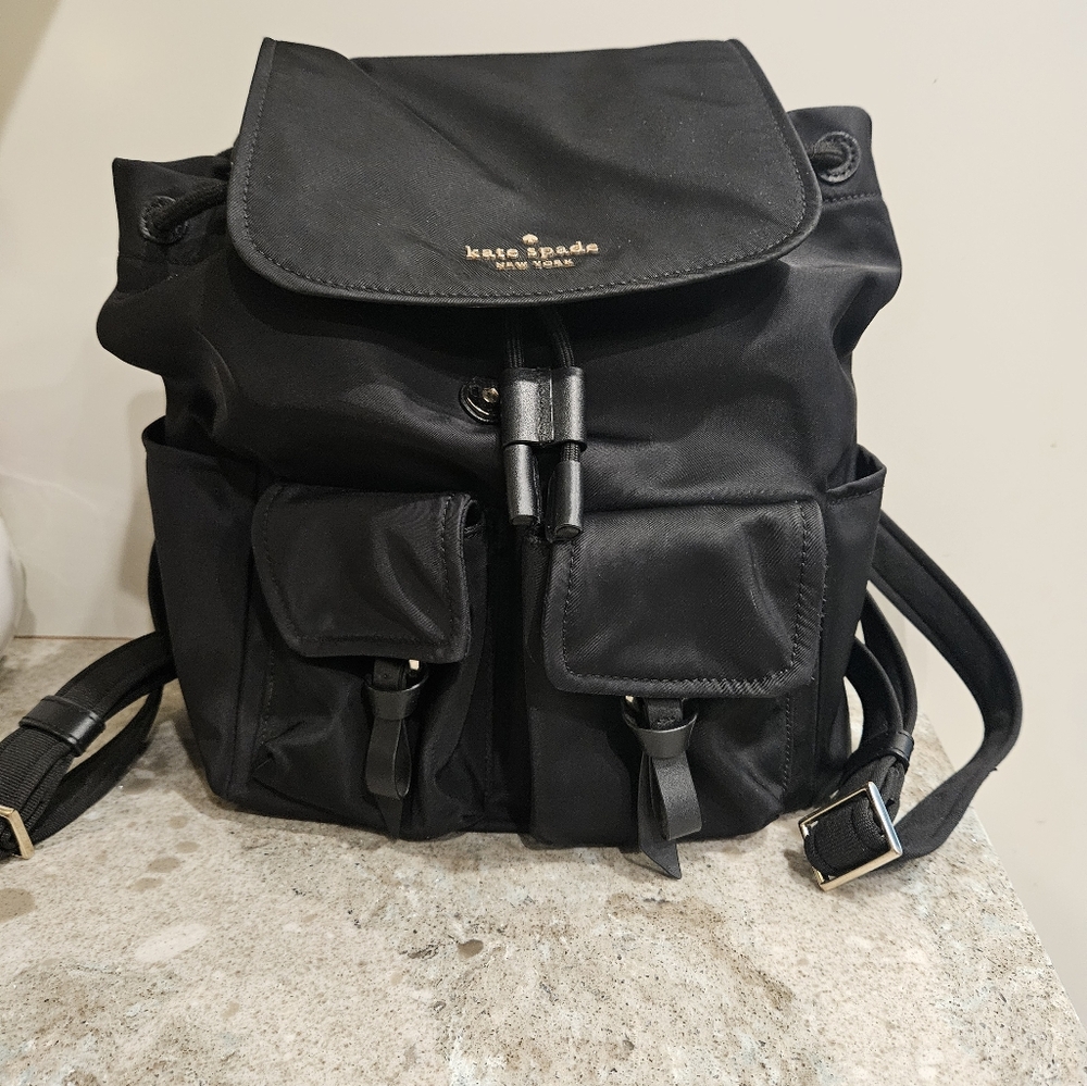 Kate Spade Black Carley Flap Nylon Drawstring Backpack w / Pockets